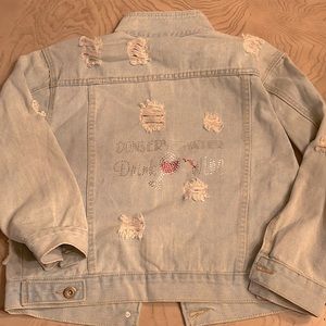 Distressed denim jacket with Crystal embellishment